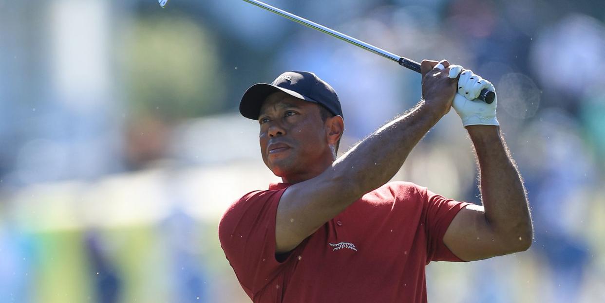 augusta, georgia april 14 tiger woods of the united states plays his second shot on the first hole during the final round of the 2024 masters tournament at augusta national golf club on april 14, 2024 in augusta, georgia photo by david cannongetty images