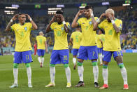 Brazil's Vinicius Junior, 2nd left, celebrates after scoring his side's opening goal during the World Cup round of 16 soccer match between Brazil and South Korea at the Stadium 974 in Doha, Qatar, Monday, Dec. 5, 2022. Left to right, Raphinha, Vinicius Junior, Lucas Paqueta, Neymar. (AP Photo/Jin-Man Lee)