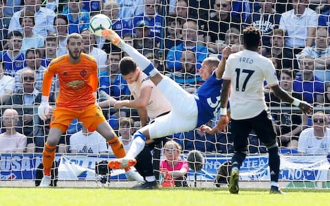  Everton's Richarlison scores their first goal - Credit: Reuters