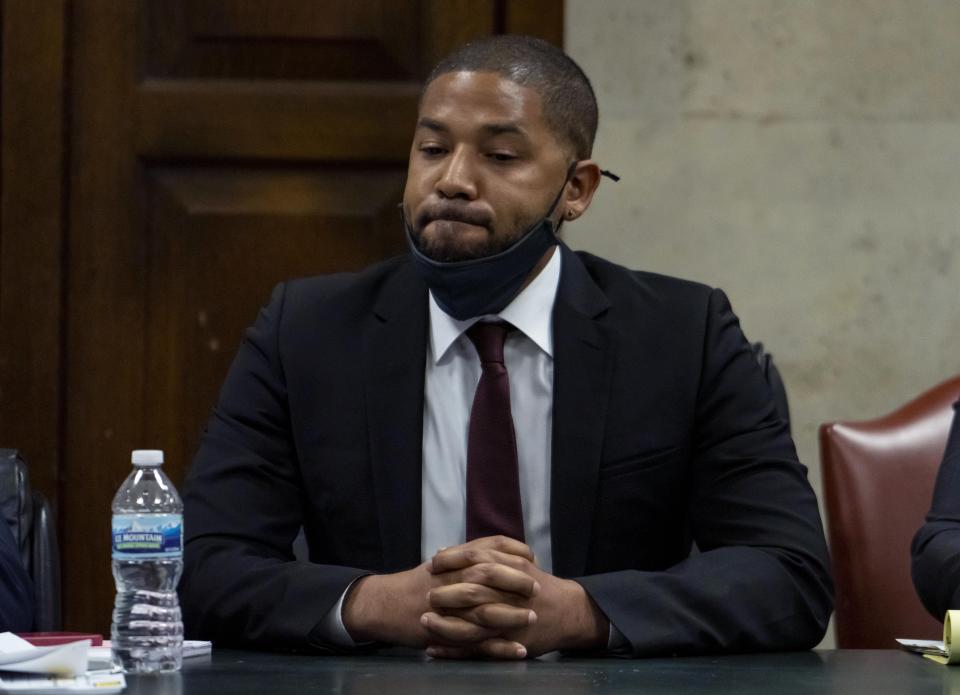 Actor Jussie Smollett listens as his sentence is read at the Leighton Criminal Court Building, Thursday, March 10, 2022, in Chicago. Jussie Smollett maintained his innocence during his sentencing hearing Thursday after a judge sentenced the former “Empire” actor to 150 days in jail for lying to police about a racist and homophobic attack that he orchestrated himself.(Brian Cassella/Chicago Tribune via AP, Pool)