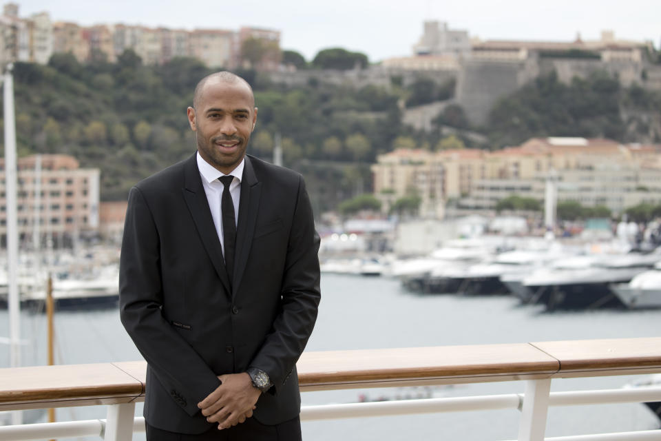 New AS Monaco head coach Thierry Henry poses for photographers as part of his official media presentation at the Monaco Yacht Club, Wednesday, Oct. 17, 2018. France's all-time leading scorer and an Arsenal great landed his first managerial job on Saturday after Monaco hired him as a replacement for Leonardo Jardim, who was dismissed this week. (AP Photo/Olivier Anrigo)