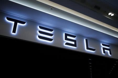 A Tesla logo is seen at its planned store in Hanam, South Korea, December 22, 2016. REUTERS/Kim Hong-Ji