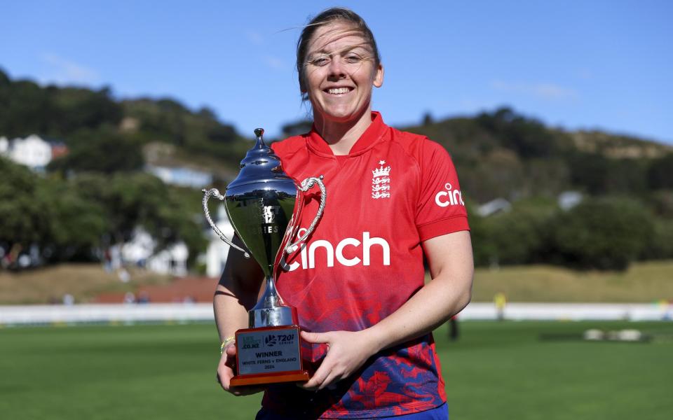 Heather Knight of England with the series trophy