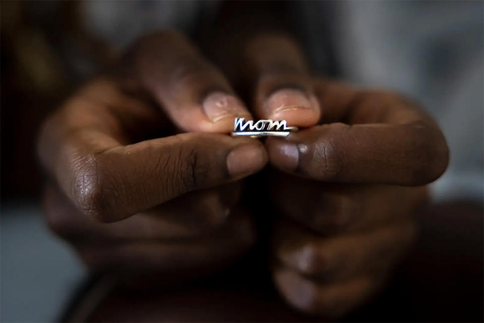 Sixteen-year-old Bremyiah holds a ring she bought for her mother. (Annie Mulligan / The Texas Tribune)