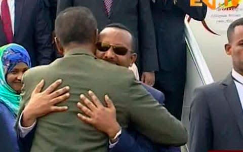 Scenes of the two leaders hugging would have been unthinkable two months ago  - Credit: ERITV