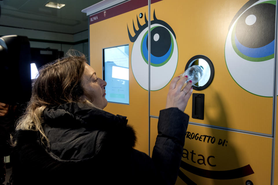 ROME, ITALY - FEBRUARY 19: Commuters line up to trade plastic bottles for transit credit at a reverse vending machine  underground metro station Malatesta  C line on February 19, 2020 in Rome, Italy. The great success of the "+Ricicli +Viaggi" project, with two million eight hundred thousand PET bottles recycled in seven months, convinced Atac to anticipate the technological and operational development phase of the initiative, installing new compactors with greater capacity in other metro stations. (Photo by Stefano Montesi - Corbis/ Getty Images)