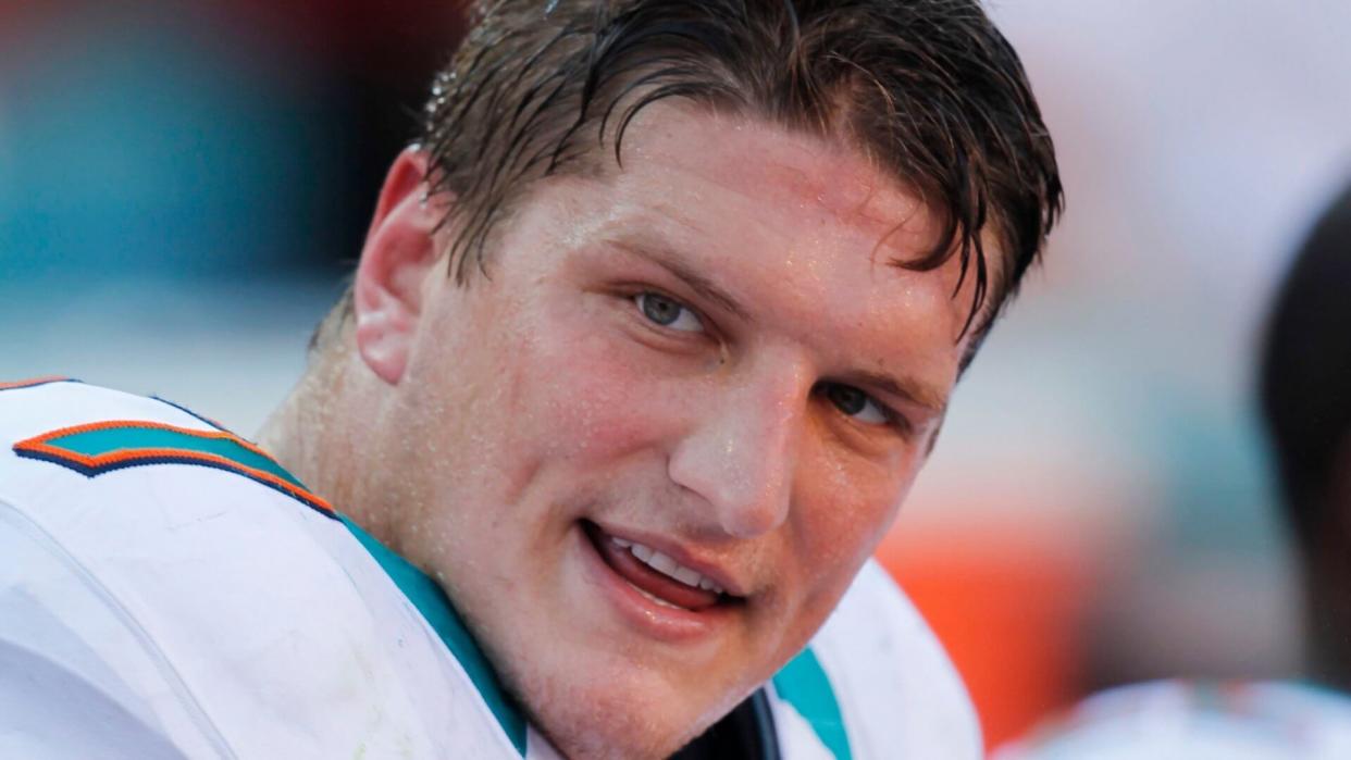 Mandatory Credit: Photo by Wilfredo Lee/AP/Shutterstock (6022953f)Jake Long Miami Dolphins tackle Jake Long (77) on the sidelines during the second half of an NFL football game against the Seattle Seahawks, in MiamiSeahawks Dolphins Football, Miami, USA.