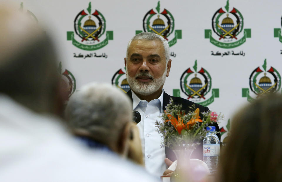 Hamas' chief Ismail Haniyeh attends a meeting with foreign reporters at al-Mat'haf hotel in Gaza City, Thursday, June 20, 2019. Hamas' chief says Israel is ignoring the terms of an indirect cease-fire agreement for the Gaza Strip. (AP Photo/Adel Hana)