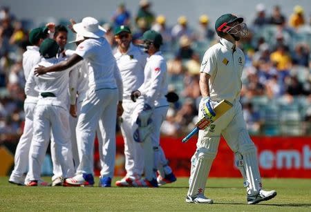 Cricket - Australia v South Africa - First Test cricket match - WACA Ground, Perth, Australia - 4/11/16 Australia's Peter Nevill reacts as he walks off the ground after being dismissed by South Africa's Keshav Maharaj at the WACA Ground in Perth. REUTERS/David Gray