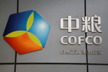 The company logo of China Oil and Foodstuffs Corporation (COFCO) is seen at its headquarters in Beijing, China, November 3, 2016. REUTERS/Thomas Peter/File Photo