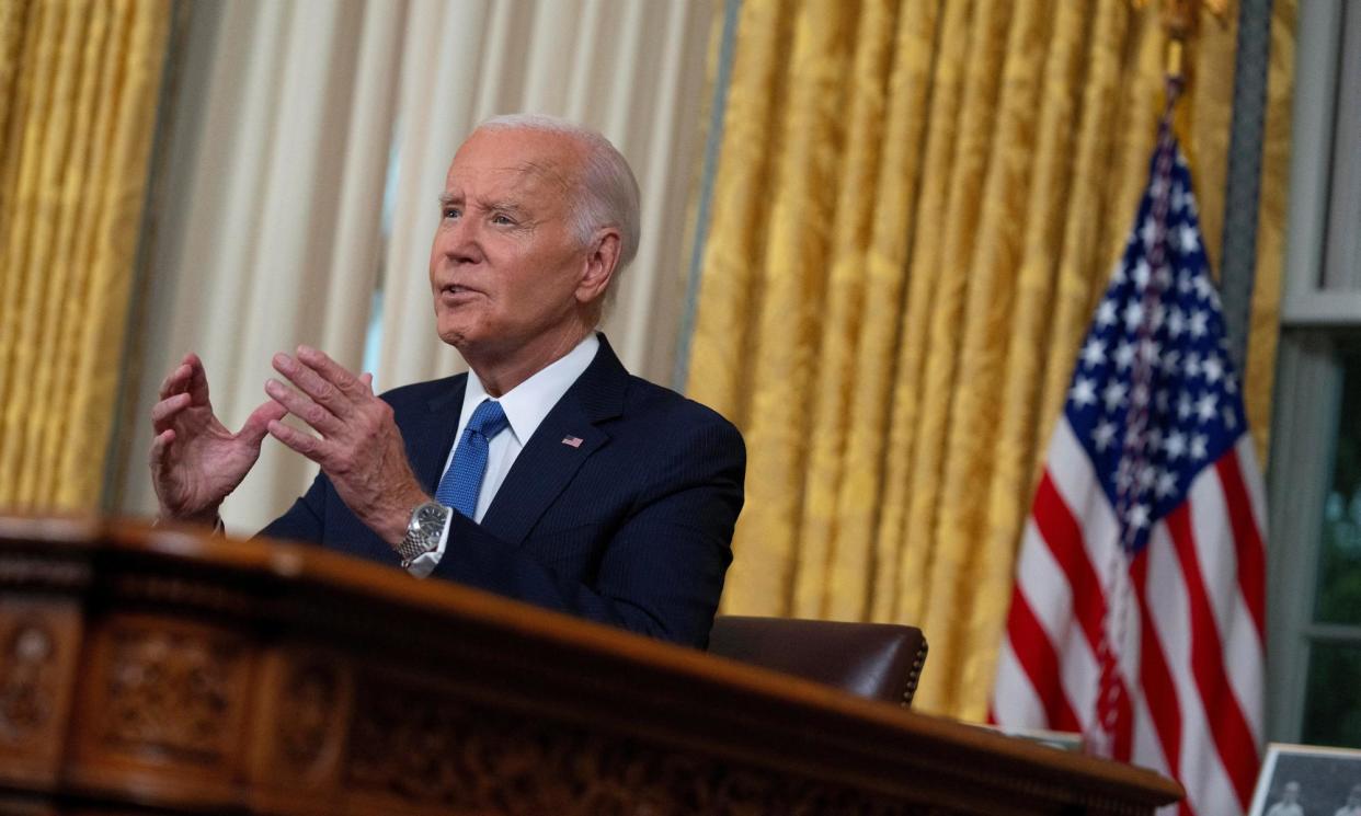 <span>Joe Biden addresses the nation from the Oval Office of the White House in Washington, on 24 July 2024.</span><span>Photograph: Evan Vucci/Reuters</span>