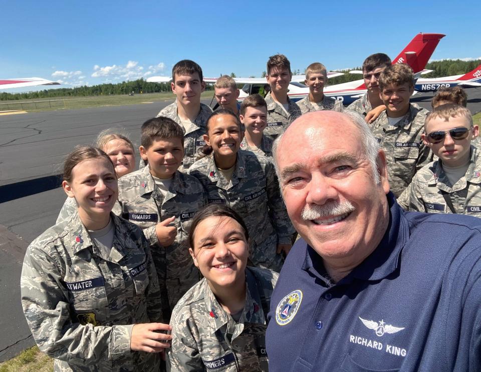 Lt. Col Richard King, the Adrian recruiter for the Civil Air Patrol, is pictured with several cadets enrolled in the CAP's cadet programming and other educational opportunities.