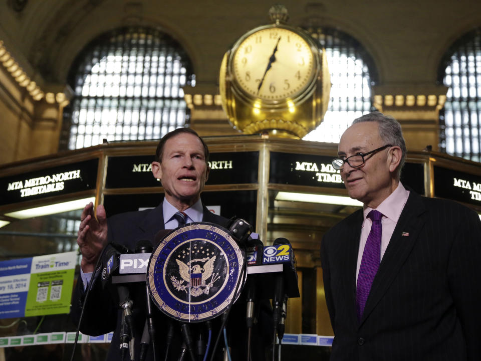 U.S. Sen. Richard Blumenthal, D-CT, left, and U.S. Sen. Charles Schumer, D-NY, comment during a news conference on a report by the Federal Railroad Administration about the Metro-North Railroad, at the information booth in New York's Grand Central Terminal, Friday, March 14, 2014. Metro-North commuter railroad has allowed an overemphasis on train times to "routinely" overshadow its safety operations, according to an FRA review that was released Friday. (AP Photo/Richard Drew)