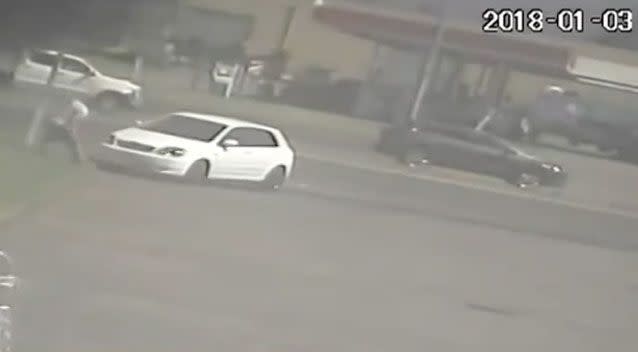 Footage shows a man being hit by a car before getting into the passenger seat. Photo: 7 News