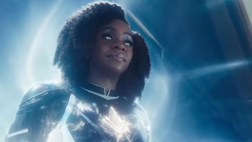 Monica Rambeau glowing in her superhero costume in The Marvels