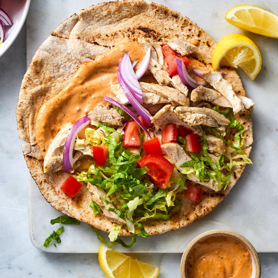 <p>We serve these lemon-oregano chicken pitas with lots of fixings tucked in, but you could ditch the pita and serve it all over cooked bulgur, cauliflower rice or a bed of greens.</p> <p> <a href="https://www.eatingwell.com/recipe/280060/chicken-pita-sandwiches-with-harissa-sauce/" rel="nofollow noopener" target="_blank" data-ylk="slk:View Recipe;elm:context_link;itc:0;sec:content-canvas" class="link ">View Recipe</a></p>