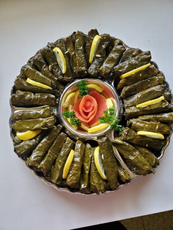 Stuffed grape leaves are on the menu at the Lebanese Festival at Our Lady of the Cedars.