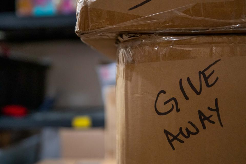 Boxes inside the Three Precious Miracles storage room in Sacaton on Nov. 30, 2023.