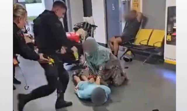 Armed Officer's Brutal Actions at Manchester Airport Spark Outrage