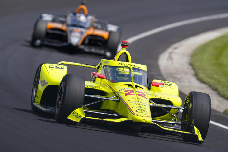 Simon Pagenaud, of France, drives through the third turn during practice for the Indianapolis 500 auto race at Indianapolis Motor Speedway in Indianapolis, Thursday, Aug. 13, 2020. (AP Photo/Michael Conroy)