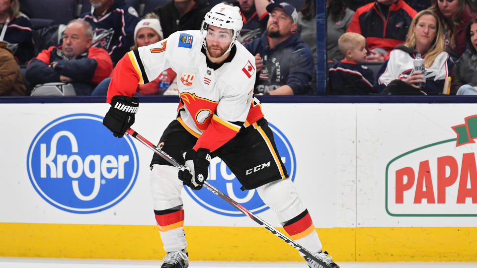 Calgary Flames defenceman TJ Brodie returned to practice for the first time after collapsing on November 14.  (Jamie Sabau/NHLI via Getty Images)