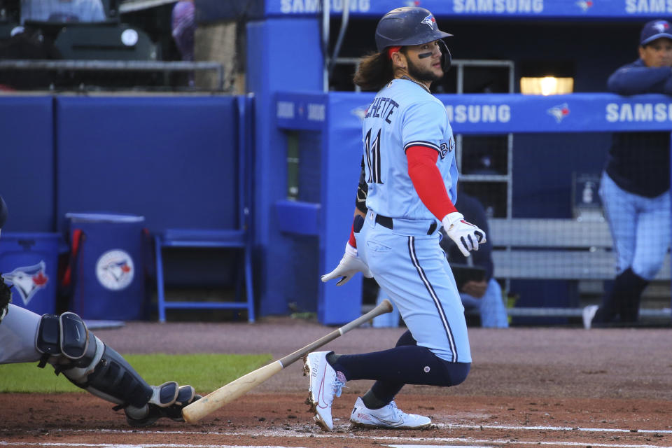 Toronto Blue Jays' Bo Bichette watches his single off Toronto Blue Jays starting pitcher T.J. Zeuch during first the inning of a baseball game Thursday, June 17, 2021, in Buffalo, N.Y. (AP Photo/Jeffrey T. Barnes)