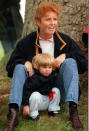 <p>Aww. How sweet is this snap of a two-year-old Princess Beatrice with her mum Sarah Ferguson taken back in 1990 [Photo: PA Images] </p>