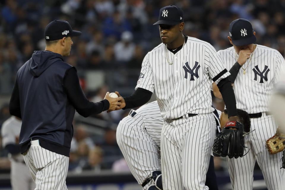 New York Yankees starting pitcher Luis Severino is taken out of the game by manager Aaron Boone during the fifth inning in Game 3 of baseball's American League Championship Series against the Houston Astros Tuesday, Oct. 15, 2019, in New York. (AP Photo/Matt Slocum)