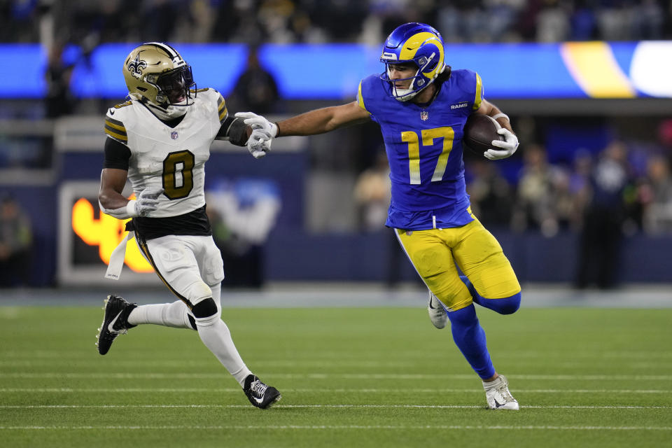 Los Angeles Rams wide receiver Puka Nacua (17) runs past New Orleans Saints safety Ugo Amadi (0) during the second half of an NFL football game Thursday, Dec. 21, 2023, in Inglewood, Calif. (AP Photo/Ashley Landis)