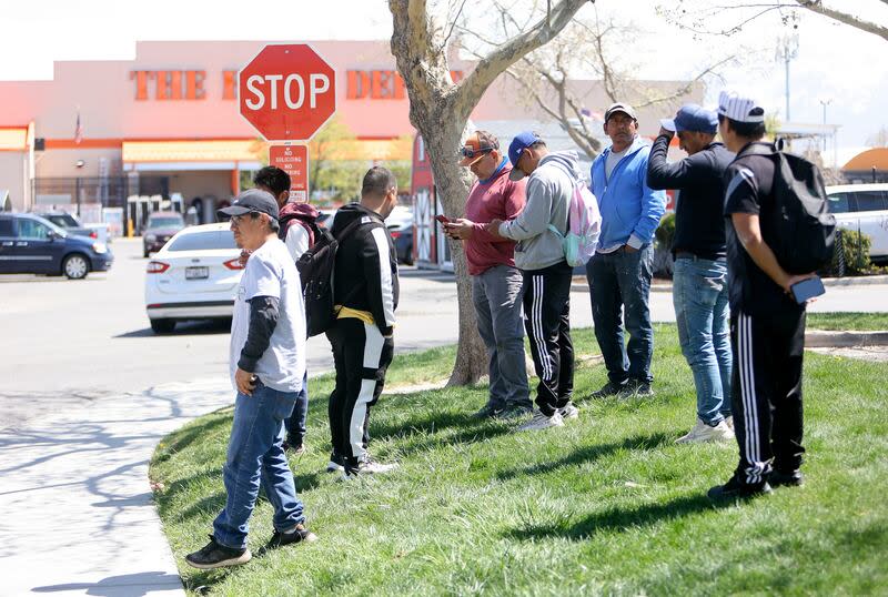 Men wait for work opportunities near Home Depot in West Valley City on Tuesday. | Kristin Murphy, Deseret News