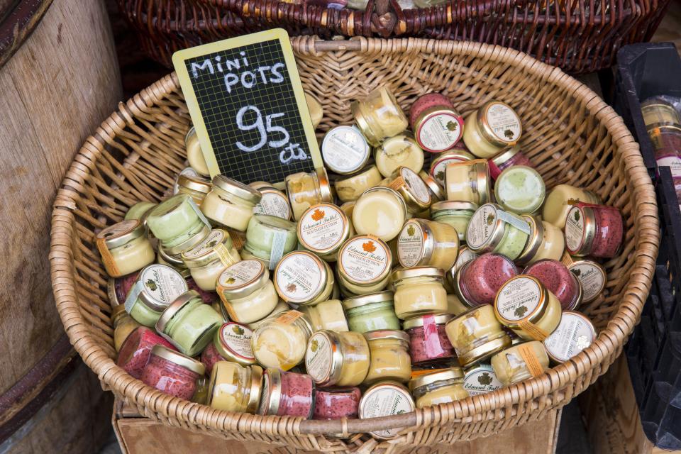 FRANCE - JULY 04:  Traditional Dijon mustard for sale in La Fabrique Bouchons shop in the old town in Dijon, Burgundy region of France (Photo by Tim Graham/Getty Images)