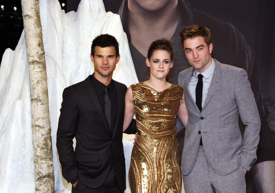 BERLIN, GERMANY - NOVEMBER 16:  (L-R) Actors Taylor Lautner, Kristen Stewart and Robert Pattinson attend the 'The Twilight Saga: Breaking Dawn Part 2'  Germany premiere at Cinestar on November 16, 2012 in Berlin, Germany.  (Photo by Anita Bugge/WireImage)