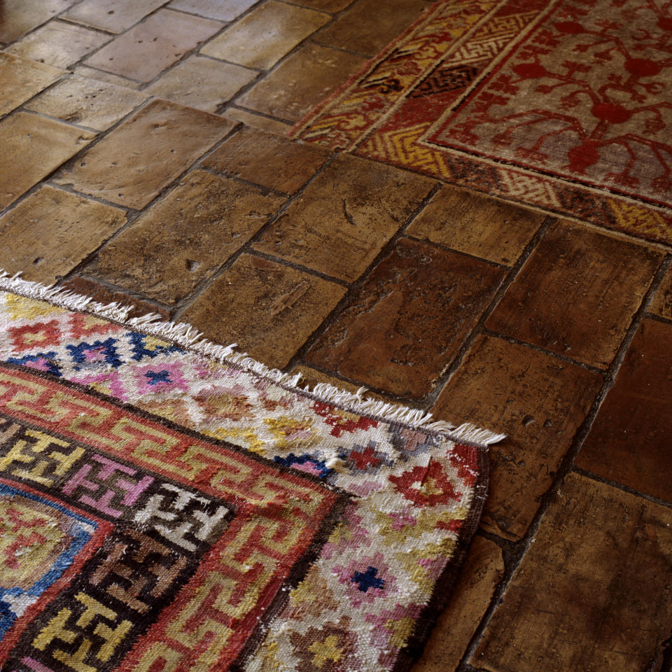 patterned rug on top of a wood floor