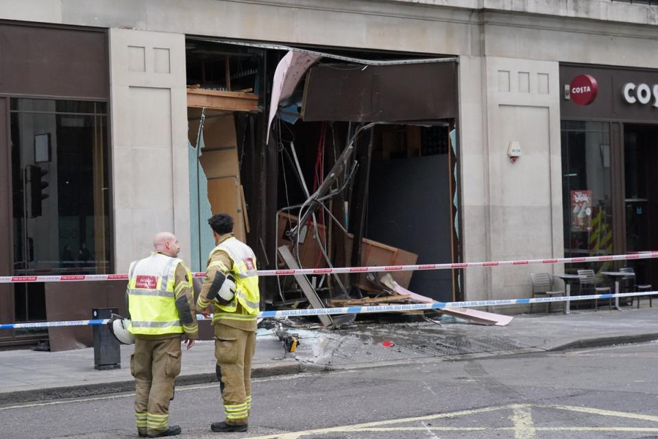 The damage left by the bus crashing into the building (Jonathan Brady/PA Wire)