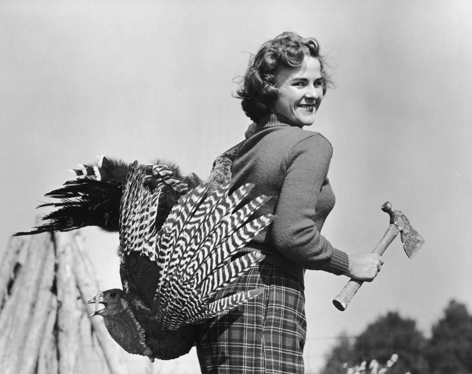 Woman Bringing Home Thanksgiving Turkey