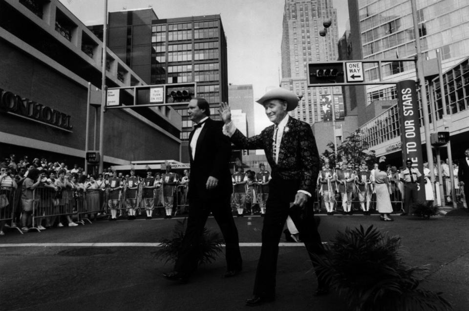 JULY 9, 1988: Roy Rogers walks with his son, Dusty, down the red carpet on the way to the "Salute to Our Stars" gala at the Cincinnati bicentennial.