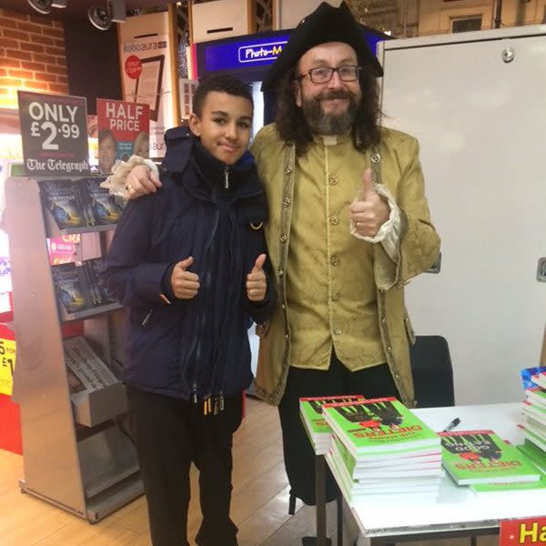 Dave pictured with a fan at a book signing