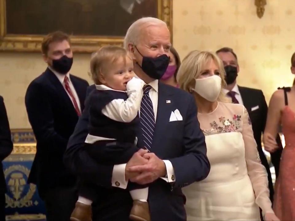 Joe Biden holds baby Beau Biden on inauguration night  (Biden Inaugural Committee via Ge)