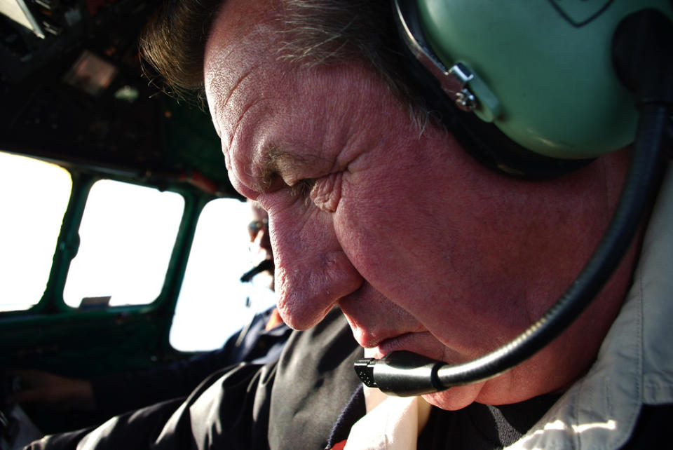 In this undated image released by The Weather Channel, Joe McBryan, President and Captain of Buffalo Airways is shown during the filming of "Ice Pilots," airing Mondays at 9 p.m. EST on The Weather Channel. The Weather Channel is in the midst of a transformation with original programming about Arctic pilots, steel workers, wind turbine and power line repairers and Coast Guard rescuers in both icy and tropical climates. (AP Photo/The Weather Channel)