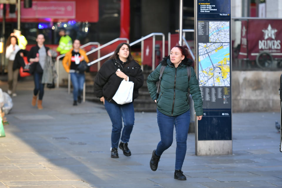 People heading away from the vicinity of Borough Market in London after police told them to leave the area.