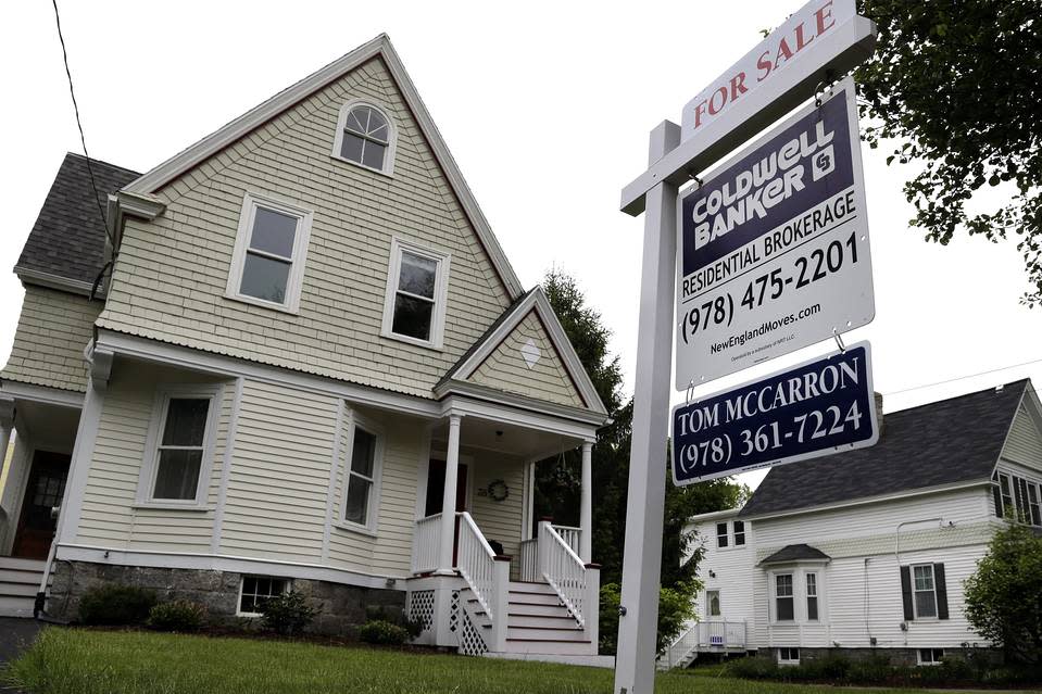 A sign advertising a home for sale in Andover, Mass., on Aug. 30.