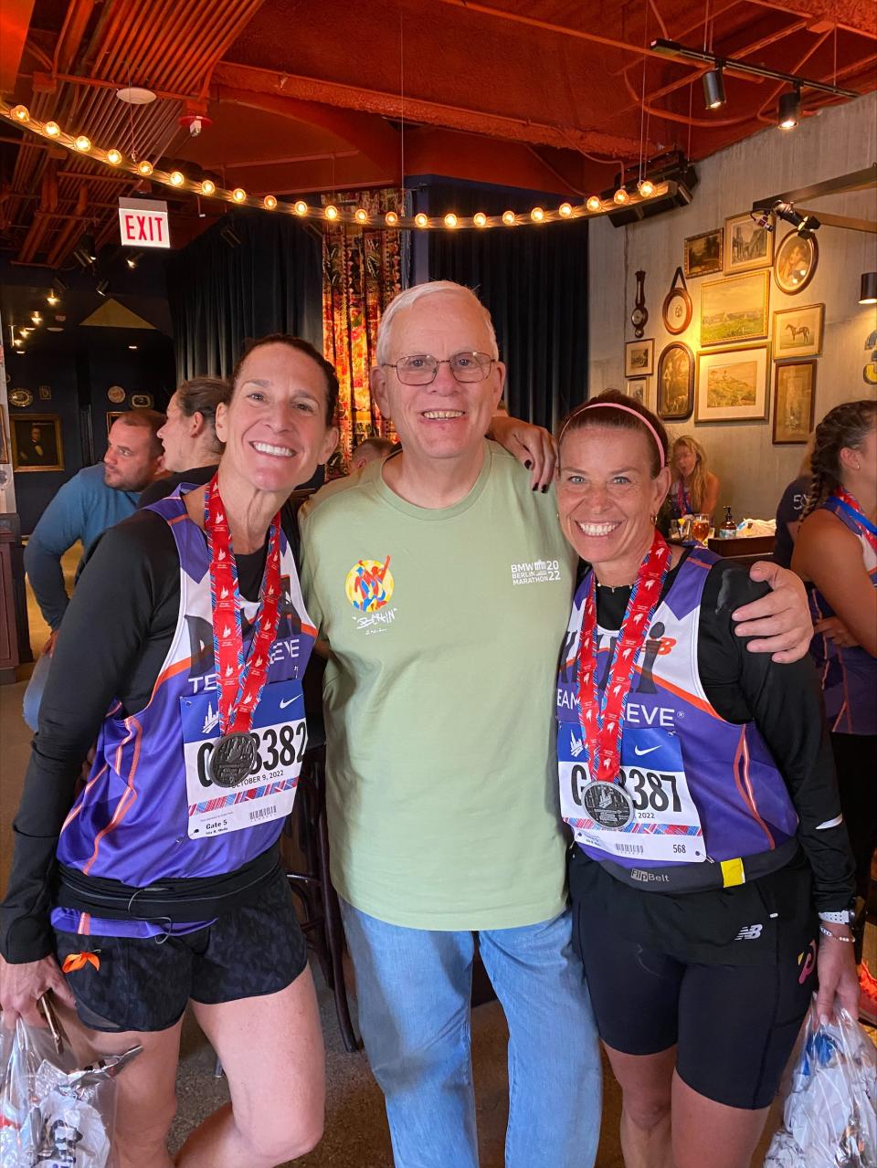 Mark Zenobia with Team Reeve runners Dana Hartman and Keri Maskell after the Chicago Marathon. Zenobia worked with hundreds of athletes who wanted to raise money for Team Reeve through competitive racing.