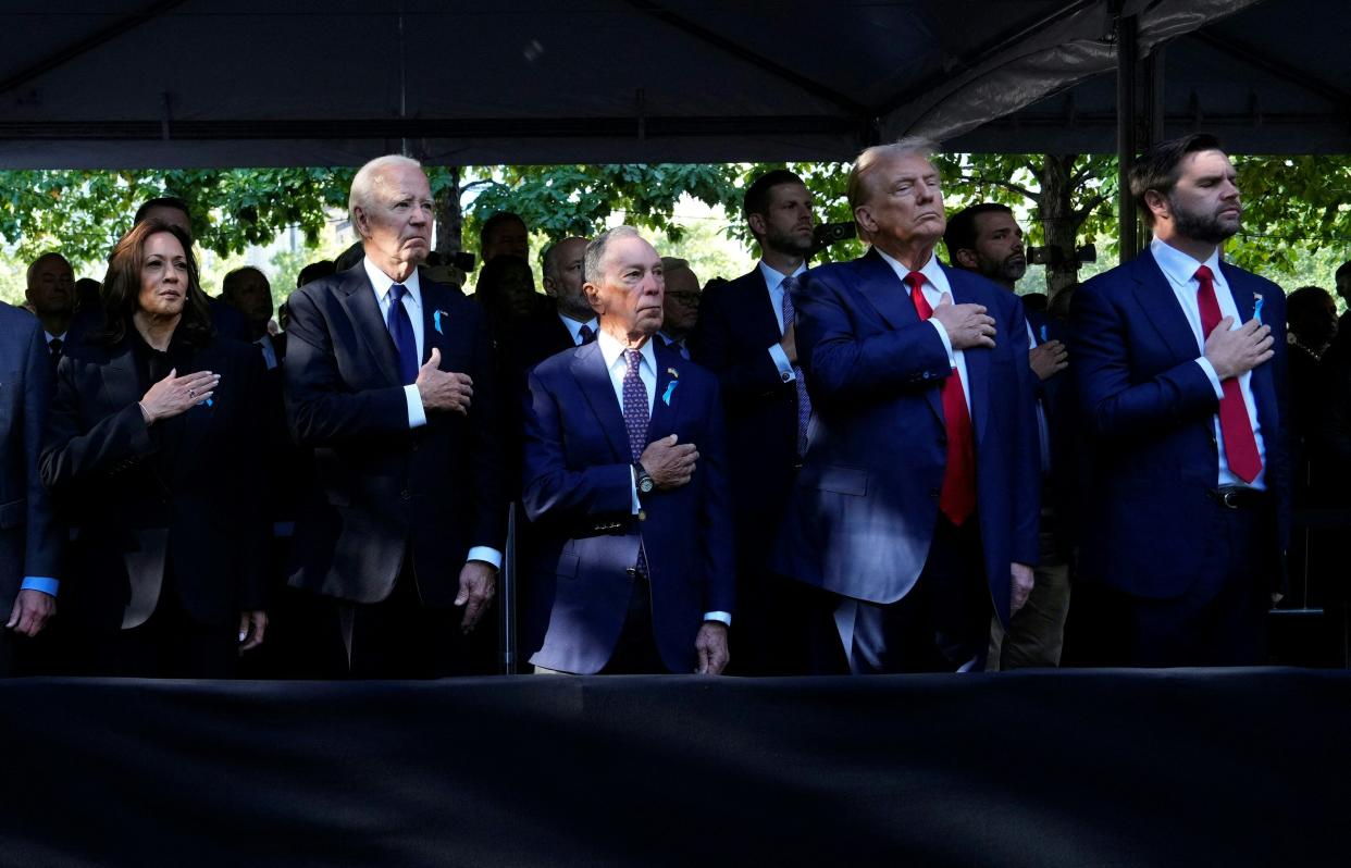 From left: Vice President Kamala Harris, President Biden, former New York City Mayor Michael Bloomberg, former President Donald Trump and Ohio Sen. J.D. Vance attend a remembrance ceremony on the 23rd anniversary of the 9/11 terrorist attacks in New York City on Wednesday. 