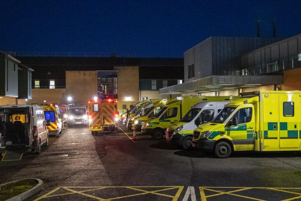 Ambulances at the entrance to the emergency department with a number of the vehicle with patients awaiting to be admitted, at Antrim Area Hospital (Liam McBurney/PA) (PA Archive)