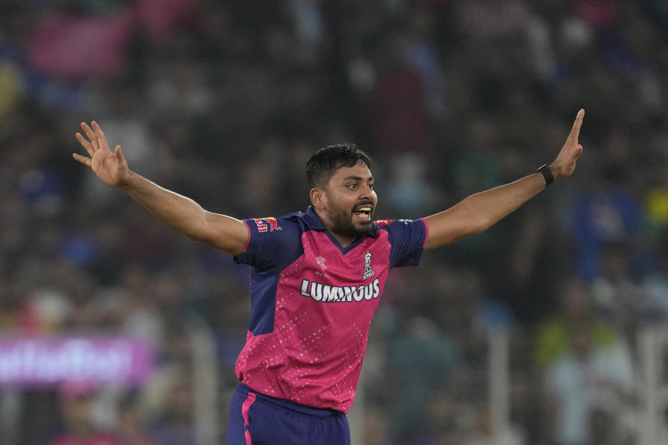 Rajasthan Royals' Avesh Khan appeals for the wicket of Royal Challengers Bengaluru's Dinesh Karthik during the Indian Premier League eliminator cricket match between Royal Challengers Bengaluru and Rajasthan Royals in Ahmedabad, India, Wednesday, May 22, 2024. (AP Photo/Ajit Solanki)