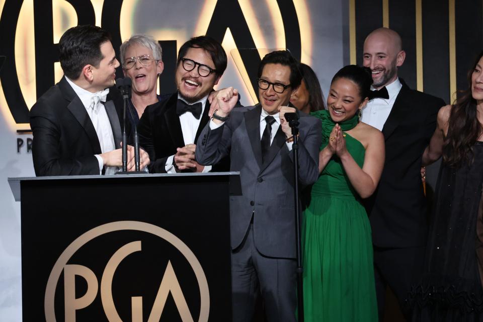 Jonathan Wang, speaking, and the team from "Everything Everywhere All at Once" on stage at the 34th Annual Producers Guild Awards at the Beverly Hilton.