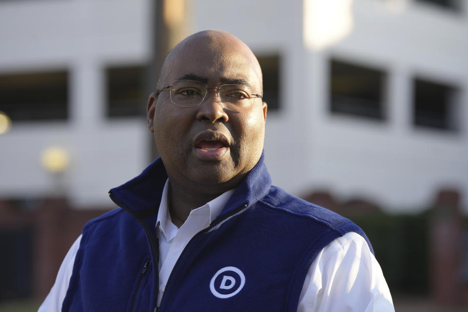 Democratic National Committee Chairman Jaime Harrison talks to reporters as polls open for South Carolina's lead-off Democratic presidential primary on Saturday, Feb. 3, 2024, in Columbia, S.C. Harrison says President Joe Biden's push for the diverse state to hold the party's first primary this year shows his commitment to Black voters. (AP Photo/Meg Kinnard)