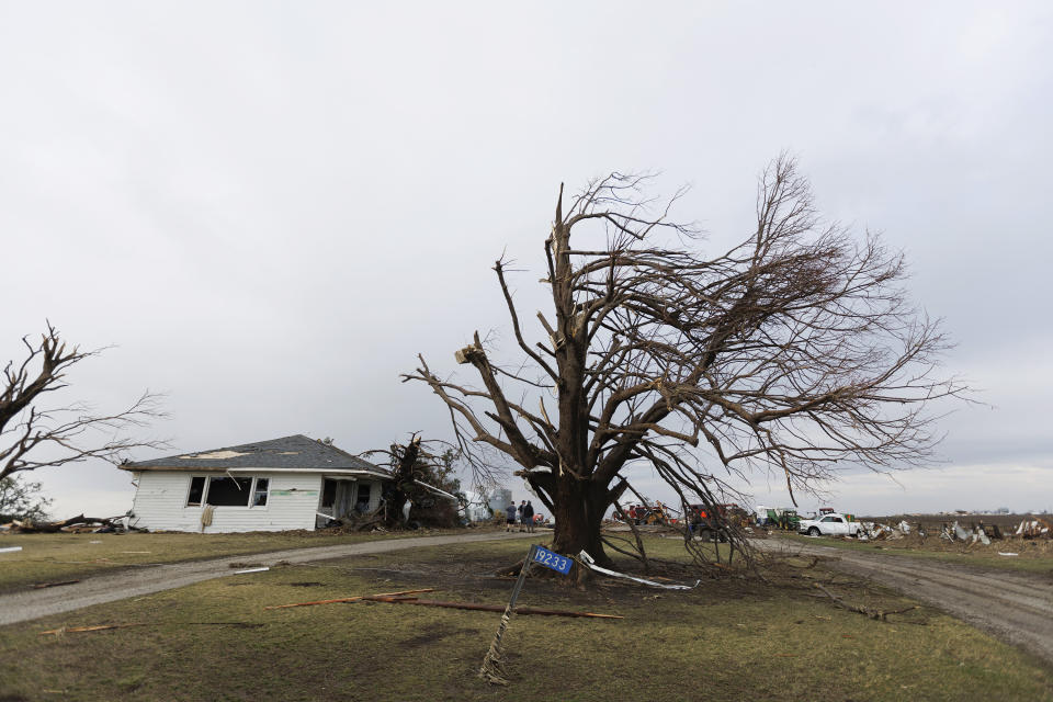 A home in the 19000 block of Wapello Keokuk Road, about 1.5 miles southeast of Martinsburg, Iowa, was badly damaged in a severe weather storm, Friday, March 31, 2023. (Kyle Ocker/The Ottumwa Courier via AP)