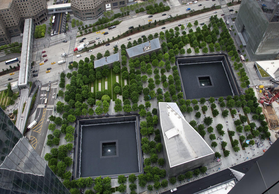 FILE - The September 11 Memorial and Museum appear from an upper floor of 3 World Trade Center in New York on June 7, 2018. Museum officials have objected and sought changes to “The Outsider,” a documentary being released this week that reveals disputes that went into development of the New York landmark, which opened in 2014. (AP Photo/Mark Lennihan, File)