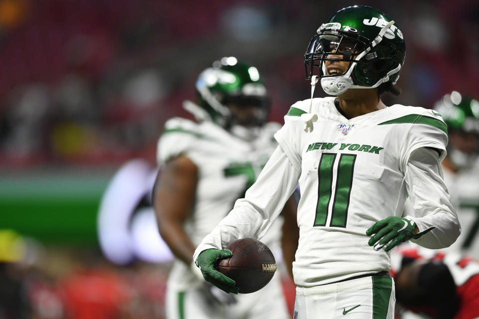 New York Jets wide receiver Robby Anderson (11) reacts to a catch against the Atlanta Falcons during the first half an NFL preseason football game, Thursday, Aug. 15, 2019, in Atlanta. (AP Photo/John Amis)